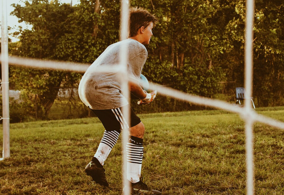 Uruguayan football player celebrating a goal on the pitch