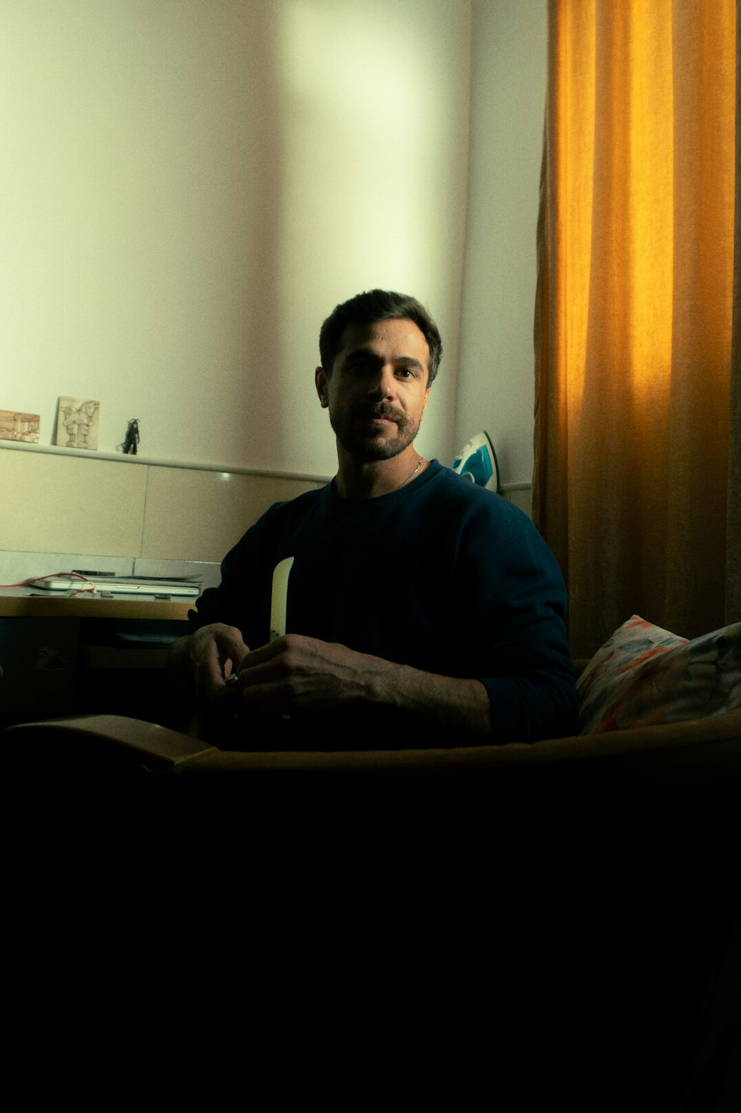 person meditating in quiet room