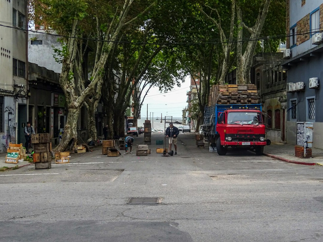 woman walking in old montevideo street